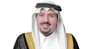 A man wearing a traditionally embroidered Saudi dress with a black besht with gold, wearing a white Saudi Ghutrah with an Eqbal, smiling in front of the camera with a transparent white background, in an image of respect for the prestige of Al-Qasim University and the QS ranking.