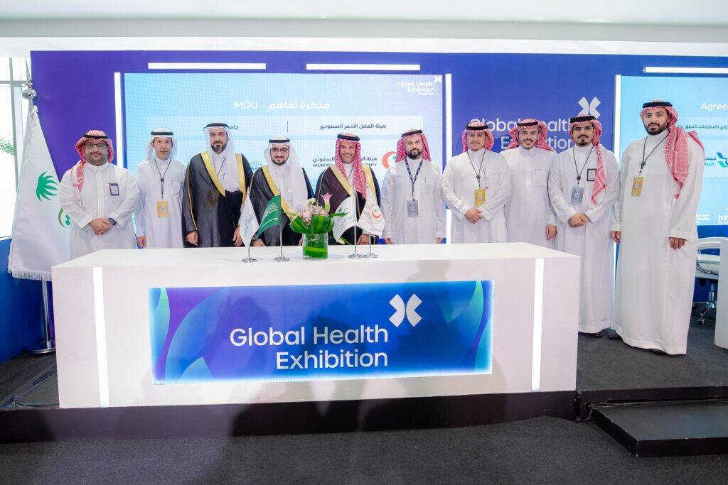 Qassim University representatives participate in the Global Health Expo to promote academic innovation.