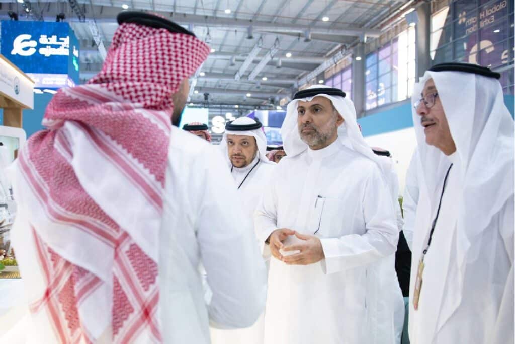 Academic discussion at the Medical City Exhibition Pavilion at the Global Health Forum at Qassim University.