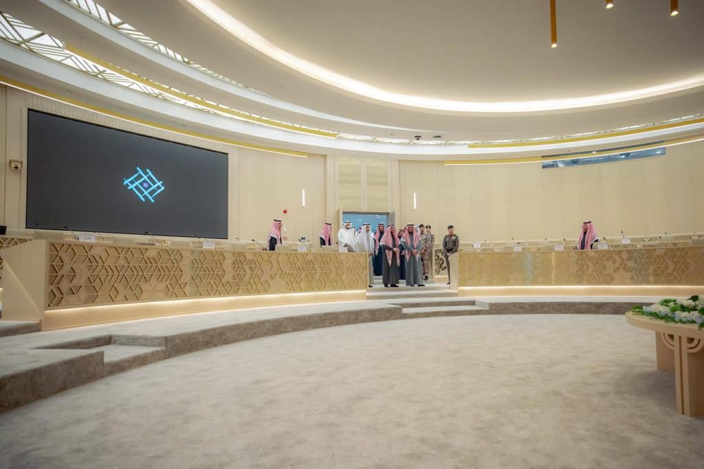 A formal university ceremony at Qassim University in the presence of the Deputy Emir of Qassim to honor academic achievements.