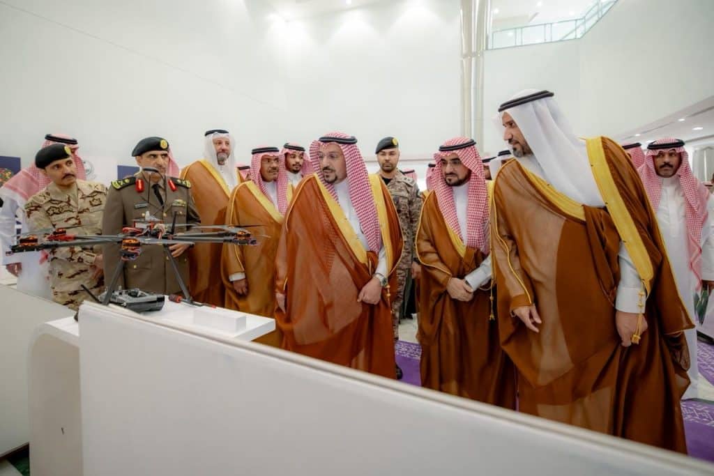 Saudi officials review modern crowd management technologies at the National Forum at Qassim University.