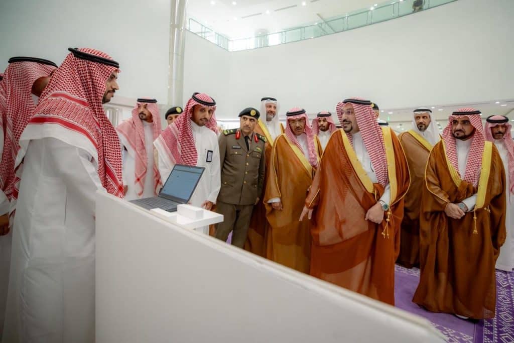 Academic presentation on crowd management during the National Forum at Qassim University.