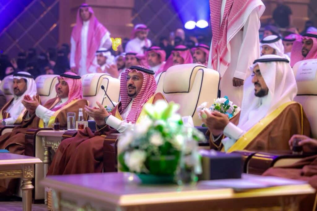 Official presence at an academic event at Qassim University with decor and lighting that highlights the venue's identity.