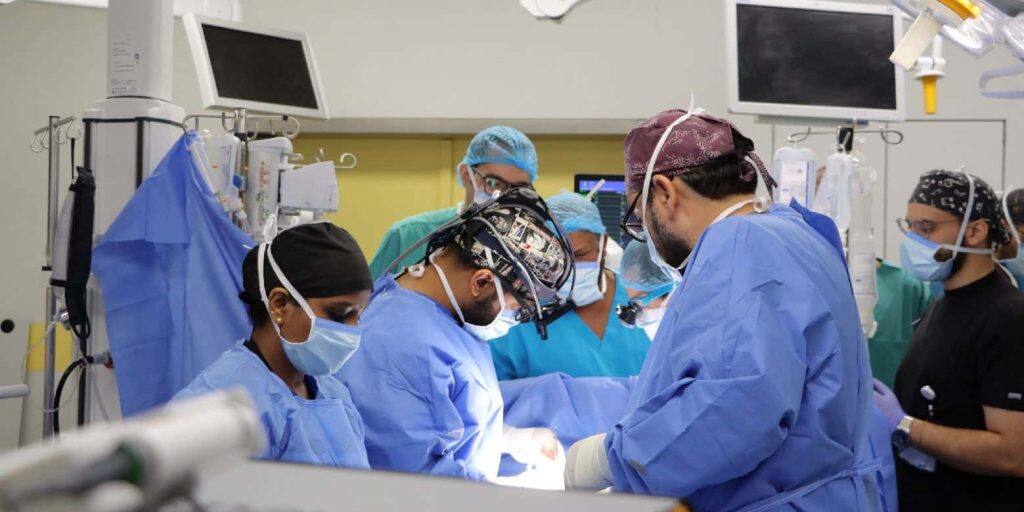 A surgical procedure inside a university hospital at Qassim University with accurate documentation in accordance with Islamic values.